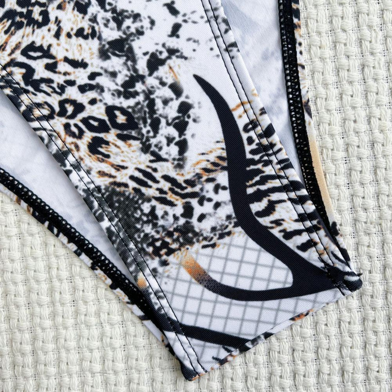 Ujumiskostüüm Rannarõivad Risti mähised päitsed Ussinahast printimine Kõrge vöökoht Seksikas Monokini suvine sügav V-kaelus, seljata ühes tükis