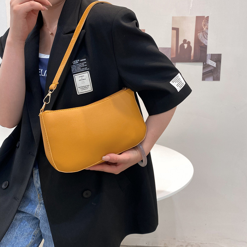 Vintage naiste PU-nahast õlakott vabaaja naiste ühevärviline väike rahakott Käekott Naistele Mini abaksillaarkotid Sidur