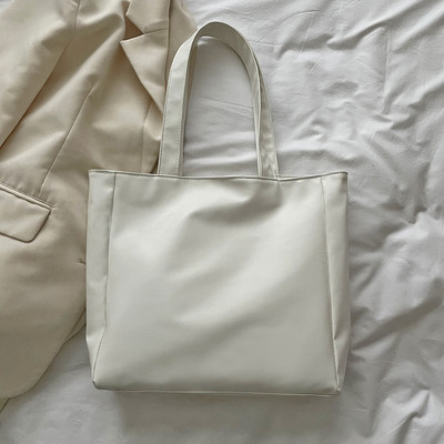 Naiste PU-nahast käekott Puuvillast polsterdatud võrega ühevärvilised ülemise käepidemega kotid Uus mood Lihtne, suure mahutavusega naiste kaenlaaukott