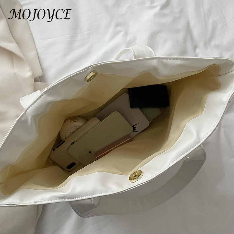 Naiste PU-nahast käekott Puuvillast polsterdatud võrega ühevärvilised ülemise käepidemega kotid Uus mood Lihtne, suure mahutavusega naiste kaenlaaukott