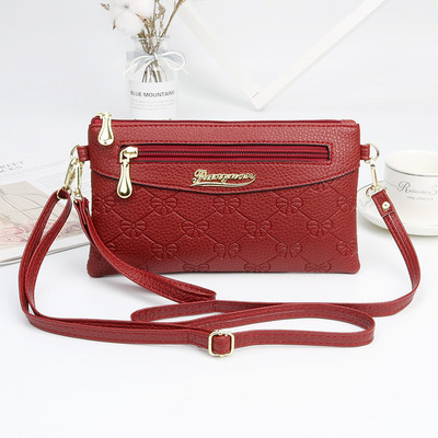 PU-nahast reljeefsed õlakotid naistele Uued moodsad multifunktsionaalsed Crossbody kotid Odav naistekott, mugav randmerihm