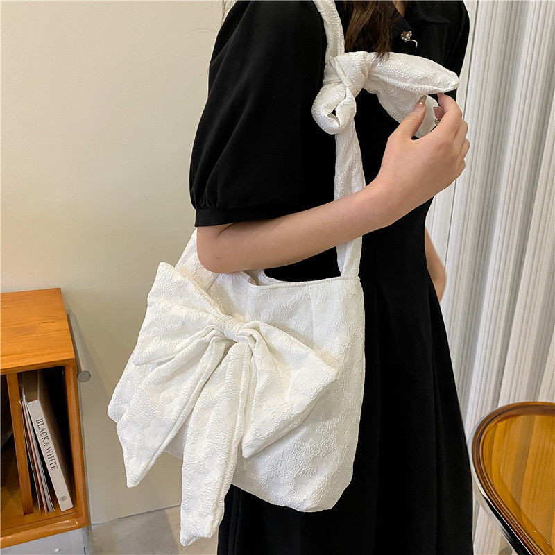 MBTI suure mahutavusega lõuendist õlakott 2023. aasta suvine moekas poekott naistele tasuta kohaletoimetamine reguleeritava rihma pikkusega