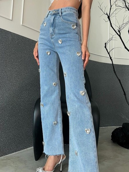 Sieviešu džinsi ar zvaniņiem