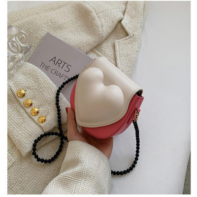Új, melegen eladó szív alakú, divatos kereszt test színű kontrasztos mini egy vállas kis táska nőknek