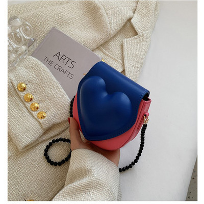 Új, melegen eladó szív alakú, divatos kereszt test színű kontrasztos mini egy vállas kis táska nőknek