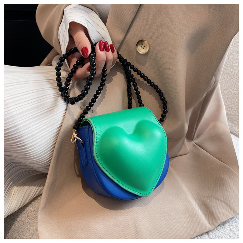 Új, melegen eladó szív alakú, divatos kereszt test színű kontrasztos mini egy vállas kis táska nőknek