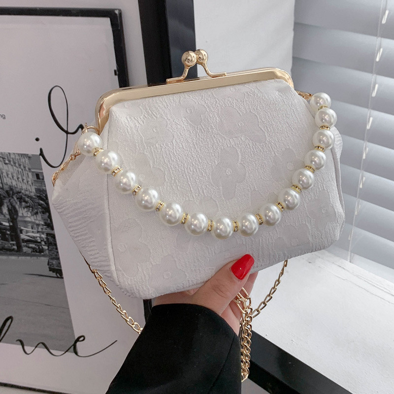 Elegantne lillekujundusega naiste õhtukott pärliga kaasaskantav ühe õlaga messenger-kott metallist klambriga ketiga naiste kott