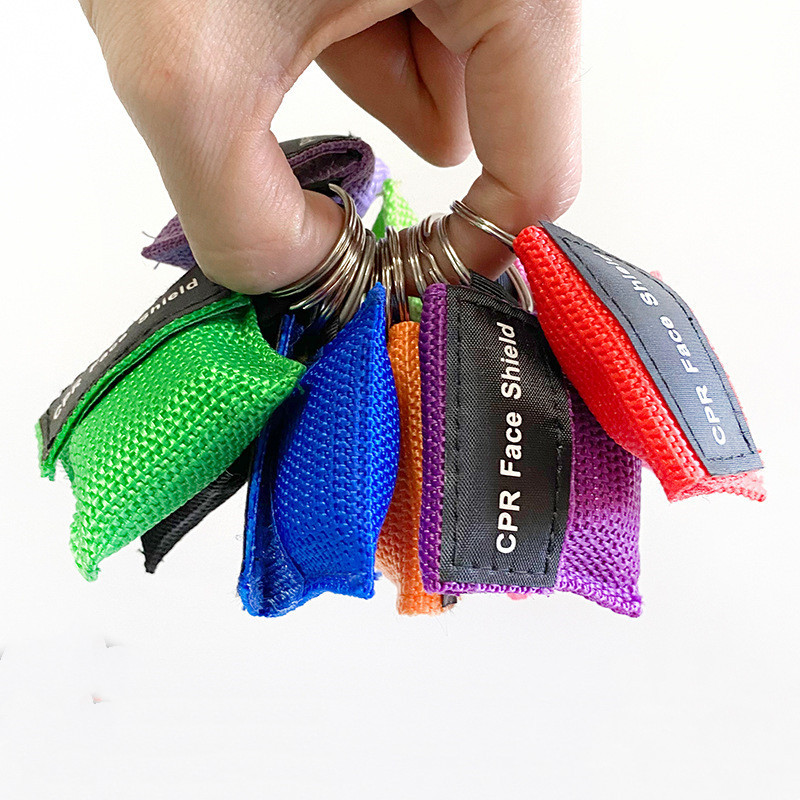 CPR-elustamismask kaasaskantav hädaabi näokaitse kunstliku hingamise ühekordseks kasutamiseks mõeldud respiraator võtmehoidja tervisehooldusvahendid