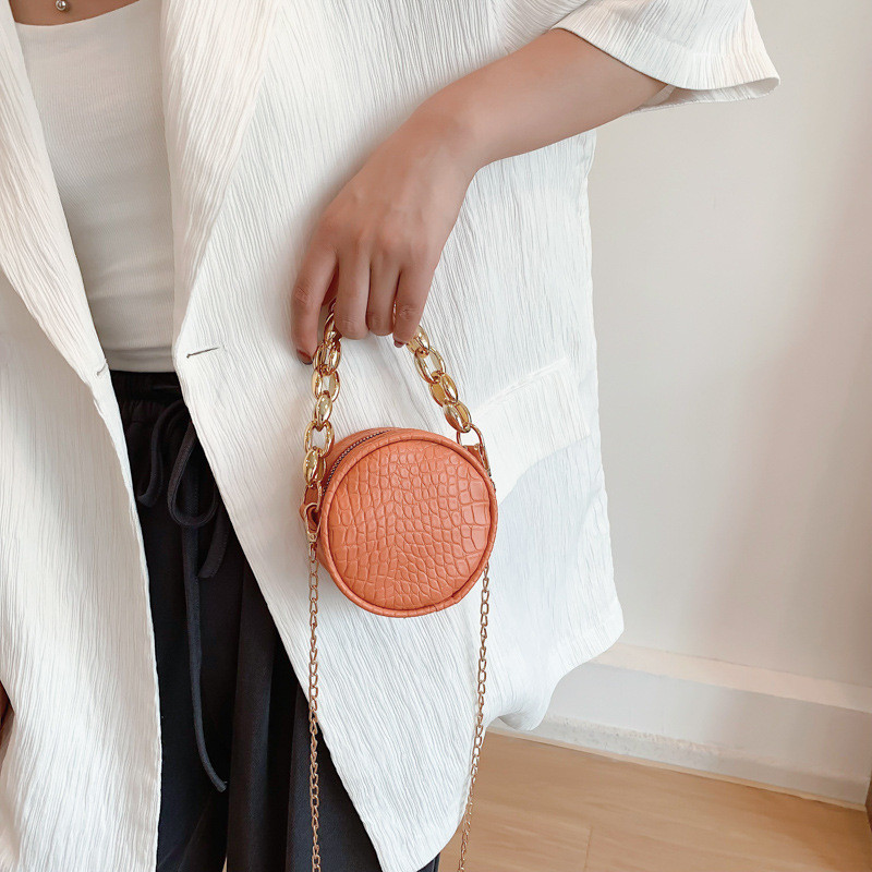 Krokodillimustriga väike ümmargune kott Mini käekott 2022 Uus ühe õlaga diagonaalne kotikett Naiste kott Moodne huulepulgakott