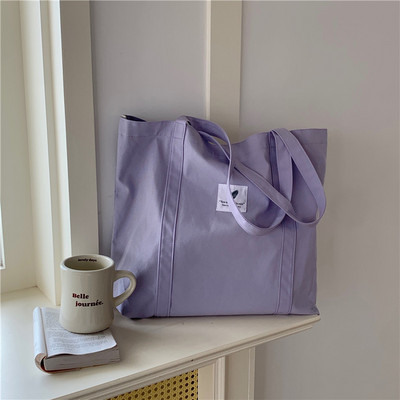 Hétköznapi retro női válltáska, egyszínű kis friss vászontáska. Irodalmi női csatos táska nagy kapacitású kézitáska