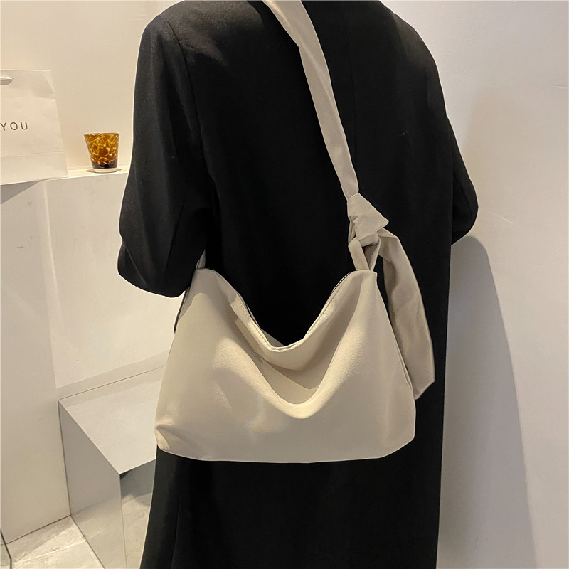 2023. aasta uus mood naiste käekott Naistele vabaaja lõuendist ristkehaga kott kett, sõlmitud rihmadega õlakott, rannabolsa