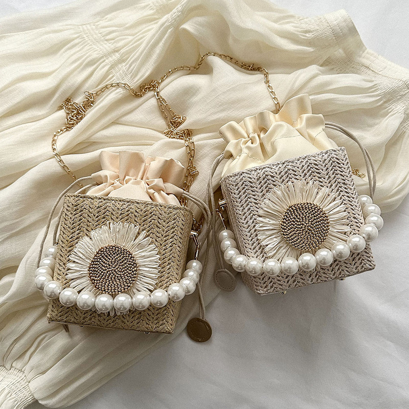 Moodne naiste kandiline ostukott Suvine õlgpärlitest kott Ülemise käepidemega käekott päikeselillede kaunistusega Elegantne naiste rahakott