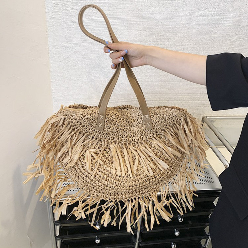 Boheemlaste naiste ümmarguse tutiga õlgedest külgmised õlakotid Trend 2022 Summer Lady vitstest rotangist kootud korv Ranna ostukäekott