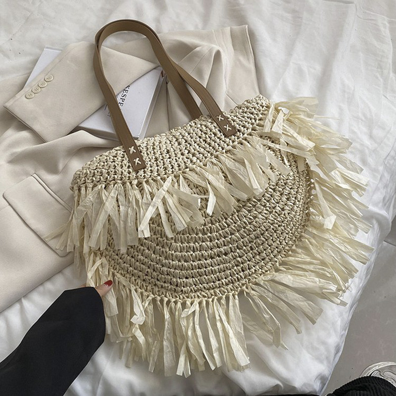 Boheemlaste naiste ümmarguse tutiga õlgedest külgmised õlakotid Trend 2022 Summer Lady vitstest rotangist kootud korv Ranna ostukäekott