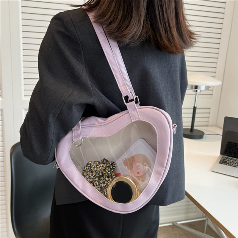 Модните жени обичат прозрачна чанта през рамо във формата на сърце PVC прозрачна дамска дамска чанта за момичета под мишниците Ежедневна ежедневна чанта за пътуване Totes Портмоне