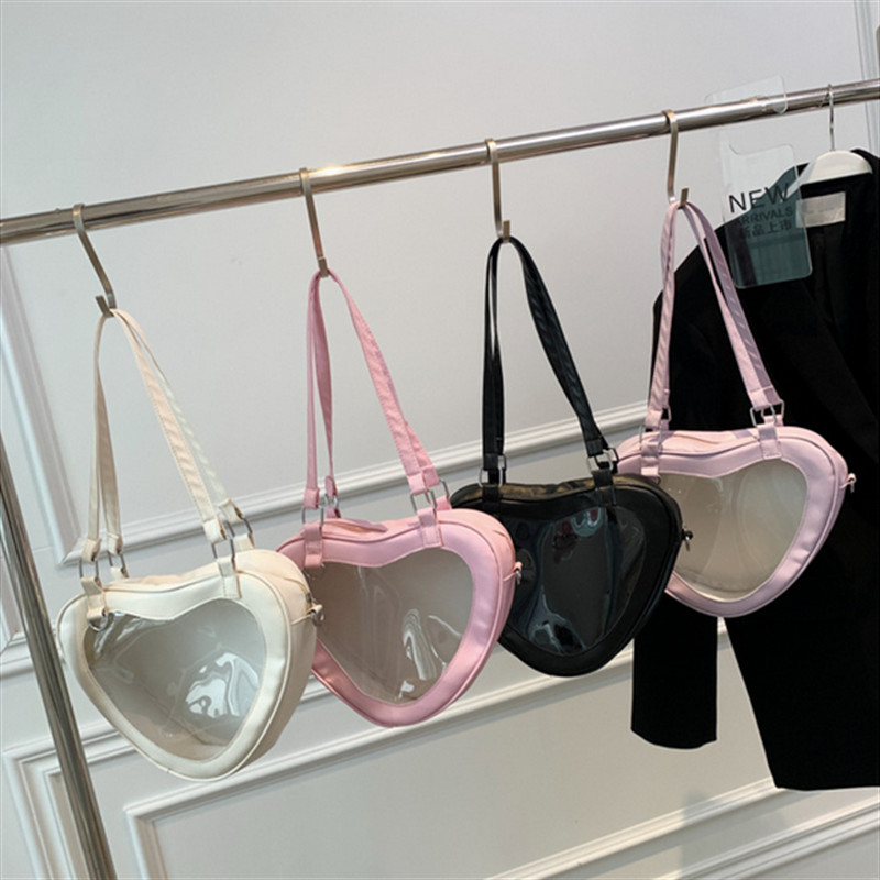Модните жени обичат прозрачна чанта през рамо във формата на сърце PVC прозрачна дамска дамска чанта за момичета под мишниците Ежедневна ежедневна чанта за пътуване Totes Портмоне