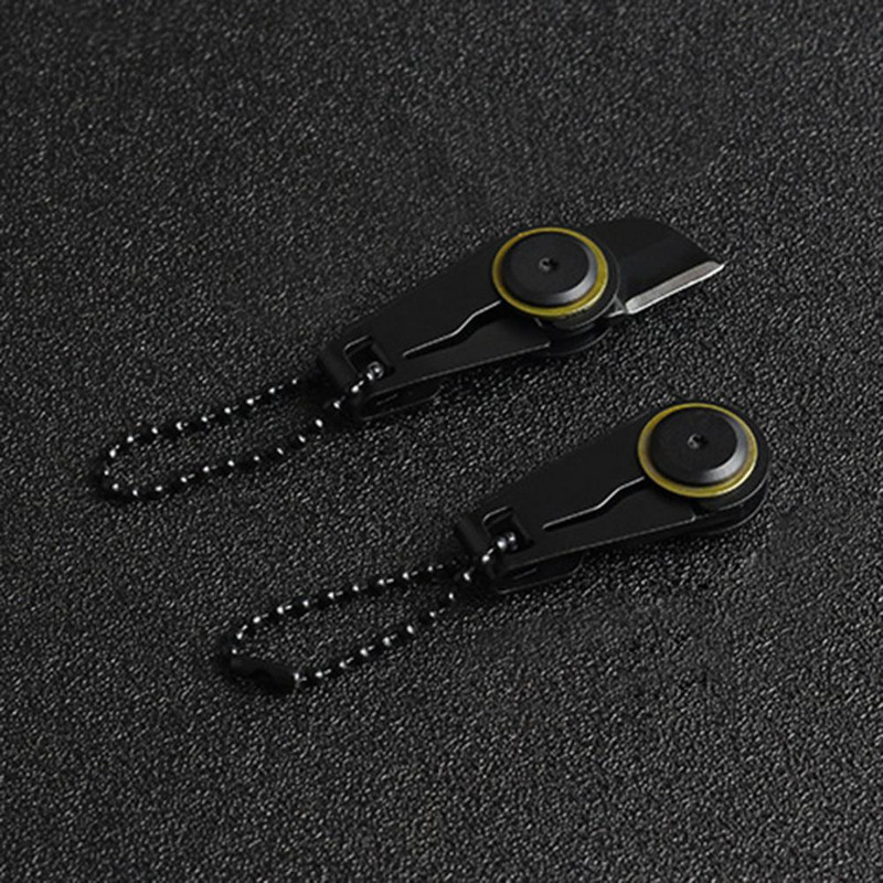 Taskulõikur terava tõmbluku kujuga võtmehoidja lõikur õues telkimine jahindus matkamine mini võtmehoidja nuga ohutus ellujäämise välitööriistad