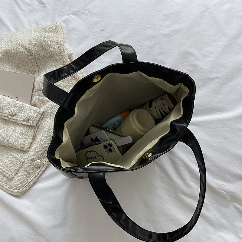 Kaasaskantavad naiste puuvillast polsterdatud nailonist suure mahutavusega reisikäekott Mood sügistalvine ühevärvilised võrega ülemise käepidemega kotid