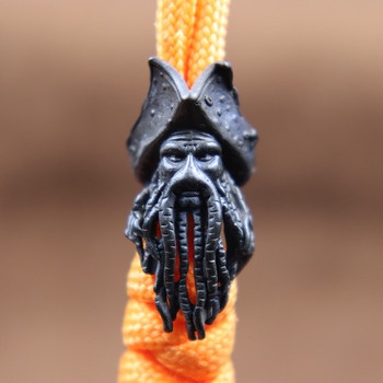 Лице на черен октопод Пиратски крал Фигурка Месинг Нож Мънисто Паракорд Въже Висулка Направи си сам Въже за чадър EDC Аксесоари за външни инструменти