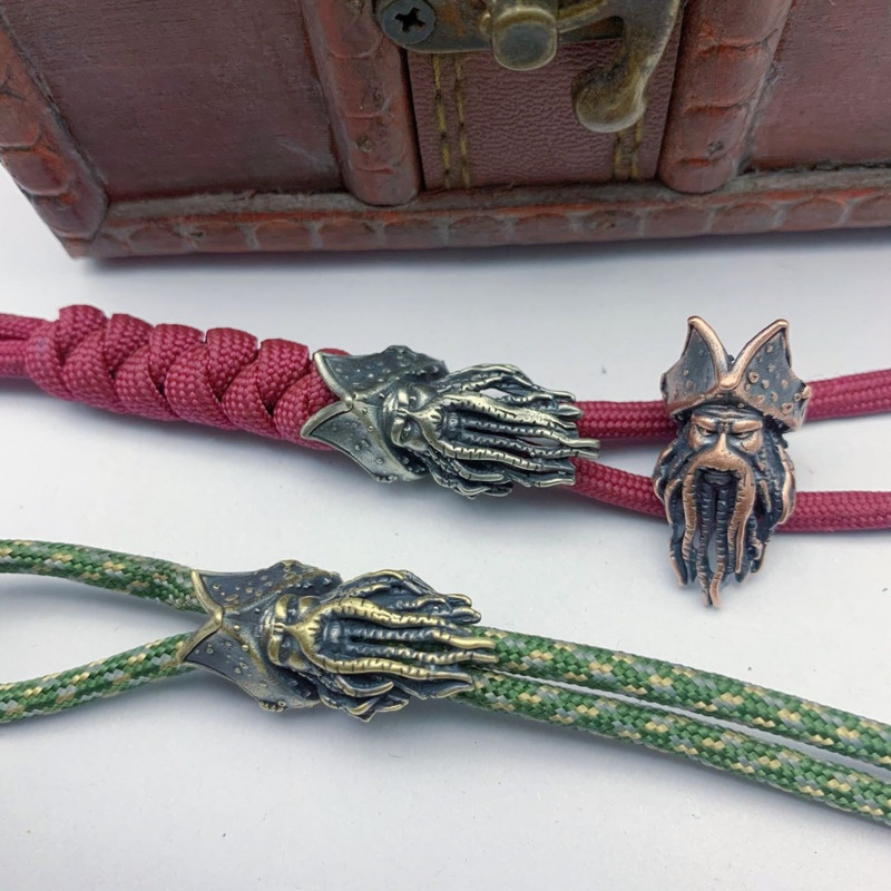 Kuumad filmitegelased Piraadid Kapten Kujukesed messingist Paracord Bead DIY Nuga Pael Ripats Amuletid EDC tarvikud fännidele Kingitus