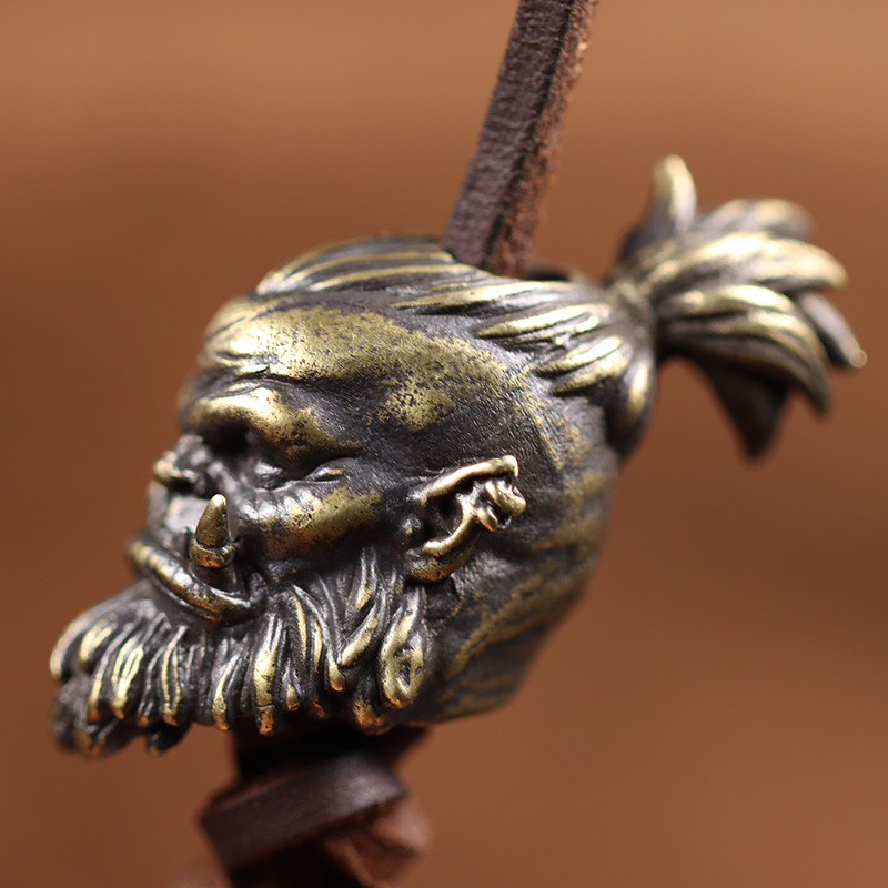 Orcish Warrior Head skulptuur messingist noa rant EDC õues DIY Paracordi tarvikud Käsitsi valmistatud kootud ripats Retro rippuv