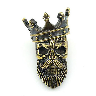 Misiņa kronis, galvaskauss, nazis, krelles, dažādi instrumenti, austi paracord ārā