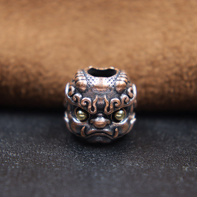 Müütiline metsaline Pixiu pea, skulptuur, nuga rant