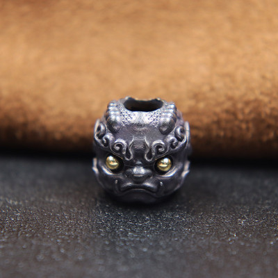 Müütiline metsaline Pixiu pea, skulptuur, nuga rant