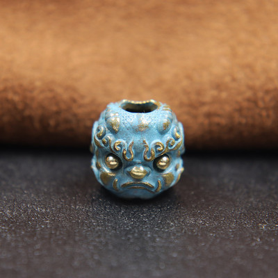 Müütiline metsaline Pixiu pea, skulptuur, nuga rant