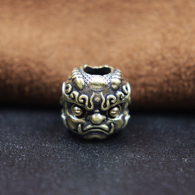 Müütiline metsaline Pixiu pea, skulptuur, nuga rant