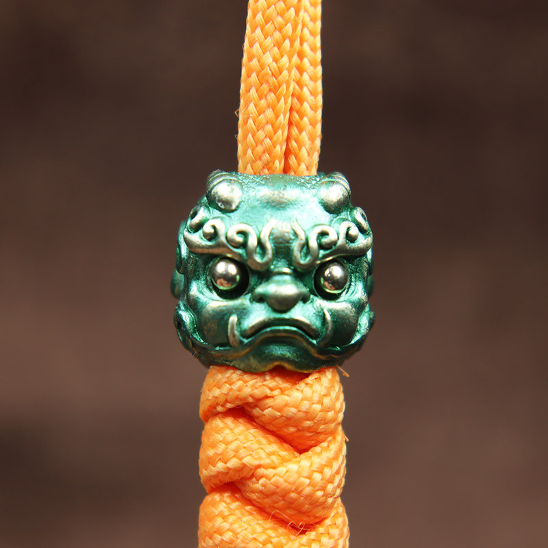 Müütiline metsaline Pixiu pea, skulptuur, nuga rant