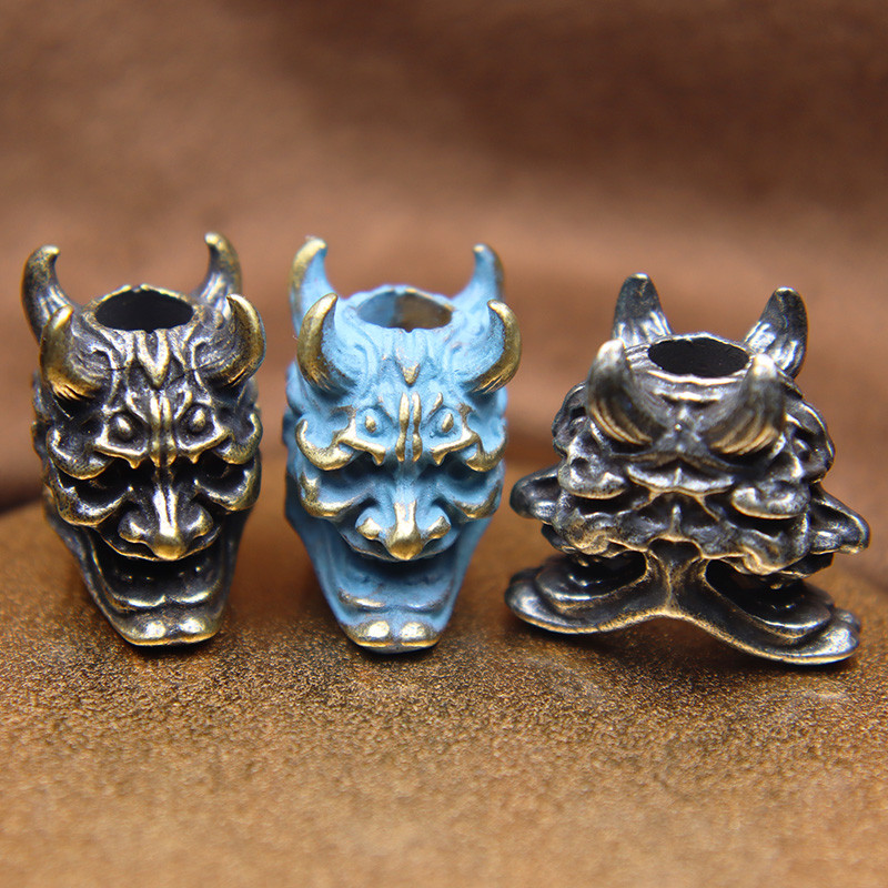 Kahepoolne Jaapani kummitus Hannya mask Messingist Paracord Noa Helmed Prajna Kolju EDC Välistingimustes DIY Vihmavarju köiega kootud tarvikud