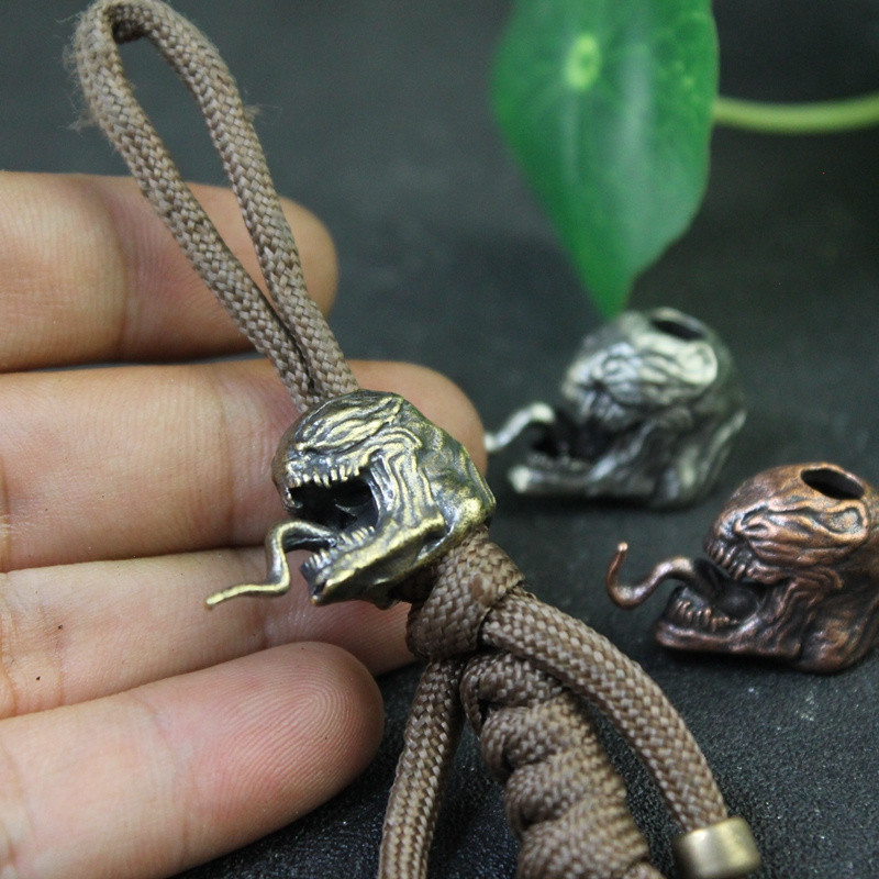 Messingist filmitegelane Antikangelane Paracord nugahelmed, kaelapael, ripats EDC õues ellujäämise vihmavarju köis käevõru DIY tarvikud