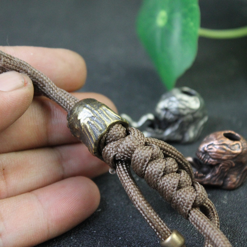 Messingist filmitegelane Antikangelane Paracord nugahelmed, kaelapael, ripats EDC õues ellujäämise vihmavarju köis käevõru DIY tarvikud