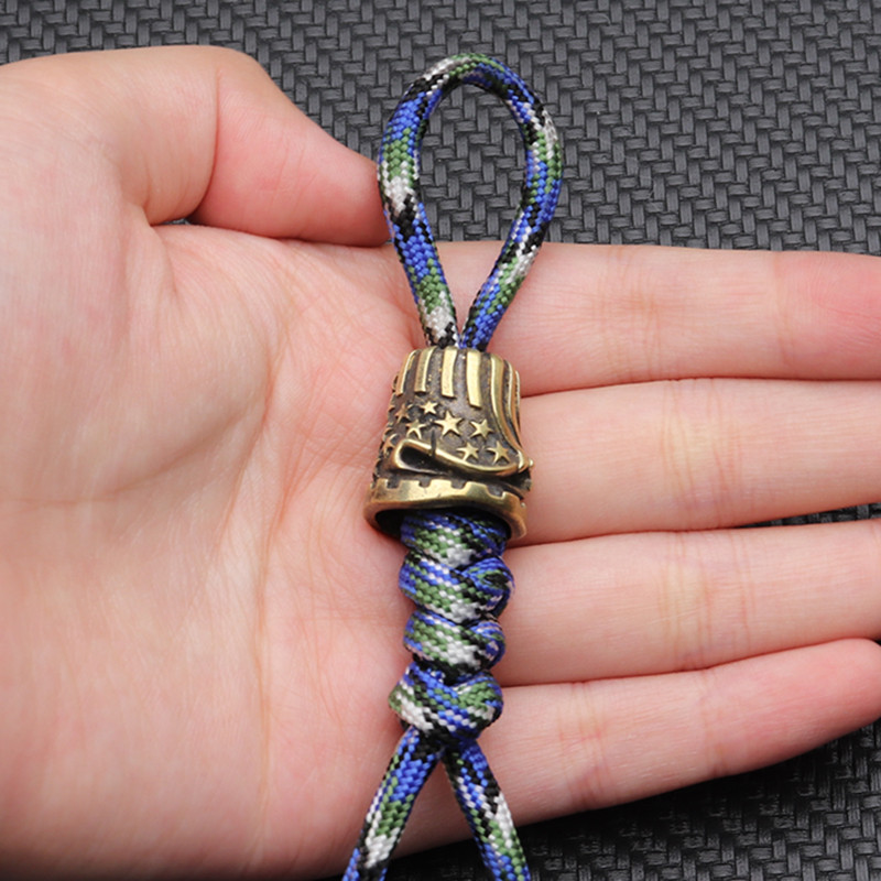 Sárgaréz 5 csillagos koponya kés Paracord gyöngyök kültéri barkácseszközök EDCLanyard medálok kulcstartók kiegészítők