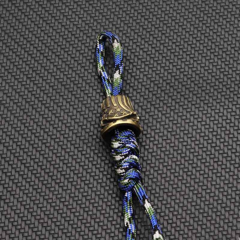 Sárgaréz 5 csillagos koponya kés Paracord gyöngyök kültéri barkácseszközök EDCLanyard medálok kulcstartók kiegészítők