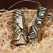 Statuie de desen animat totem de pasăre cu patru ochi din alamă de epocă