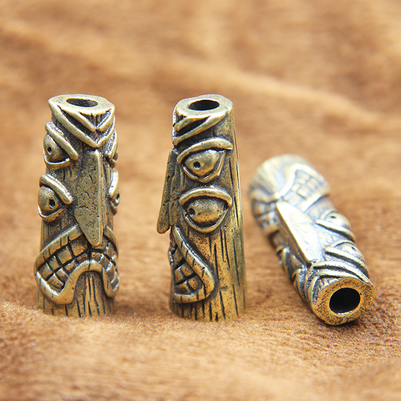 Statuie de desen animat totem de pasăre cu patru ochi din alamă de epocă