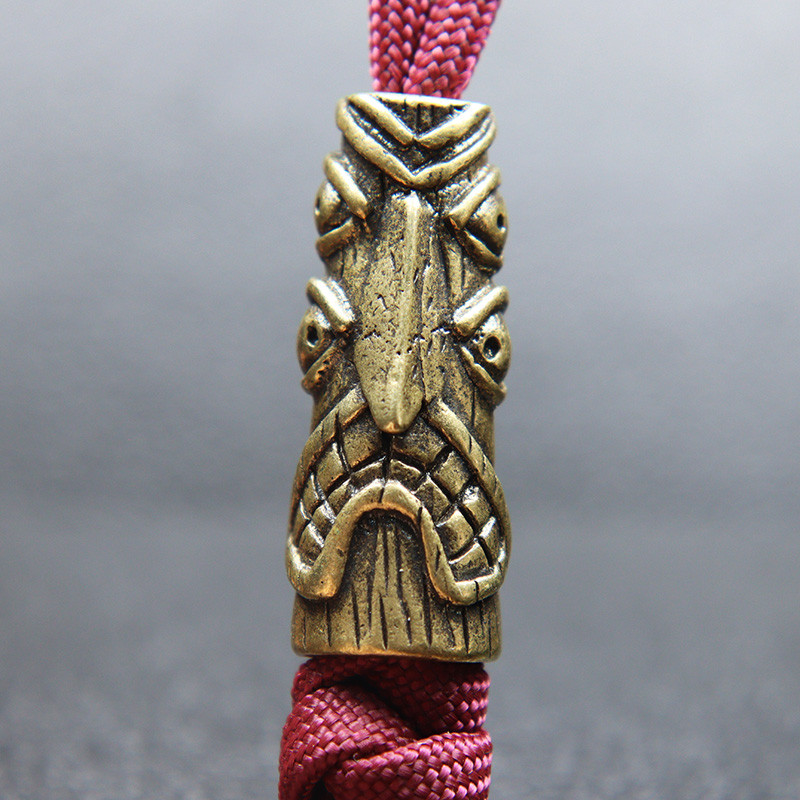 Statuie de desen animat totem de pasăre cu patru ochi din alamă de epocă