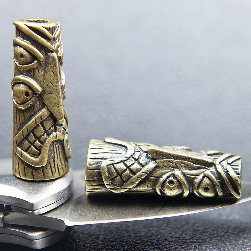 Statuie de desen animat totem de pasăre cu patru ochi din alamă de epocă