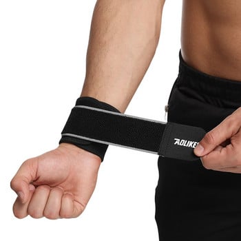 AOLIKES 1PCS Регулируема спортна гривна Wrist Brace Wrap Bandage Support Band Gym Strap Безопасен спортен протектор за китката Ленти за ръце