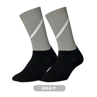 Sportlane elukutse Jalgrattasokid Meeste Libisemisvastased Õmblusteta Aero Bike Kulumiskindlad Maanteerattasokid Helkurkaitsesokid