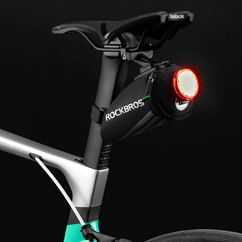 0,5 L prijenosna torba za bicikl Reflektirajuća jastučna torba za sedlo Najlonska stražnja torba Cestovni dodaci za brdski bicikl Biciklistička torbica za pohranu