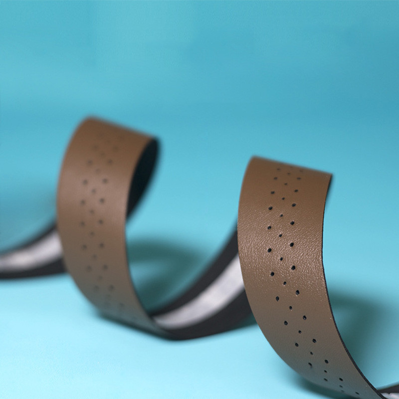 Velosipēda stūres lente kalnu šosejas velosipēda PU ādas perforēta josta ar 2 spraudņiem elpojošas roktura aptinošās siksnas RR7188