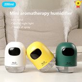 200 ml valge mini õhuniisutaja aroomi eeterlike õlide difuusor koos romantilise lambiga USB Mist Maker aroomiteraapia niisutajad koduks