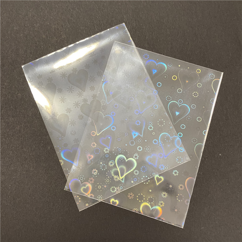 50 τμχ/Παρτίδα Foil σε σχήμα καρδιάς Επάνω μανίκια φόρτωσης λέιζερ για επιτραπέζια κάρτα παιχνιδιών YGO Προστατευτικό φωτογραφιών Κάλυμμα εμπορικών καρτών