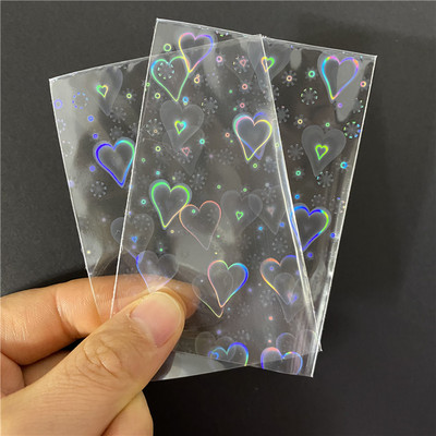 50 tk 58x87mm Laser Star kalliskivist südamekaardi varrukad vilkuvate kaardikile kaitseks Holograafiline foolium Tarokaartide sidekile