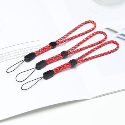 10 vnt. rankinio riešo dirželis, reguliuojami nailoniniai riešo dirželiai, raktų pakabuko virvelė mobiliojo telefono dėklo laikikliui, fotoaparatas, USB, ženklelis