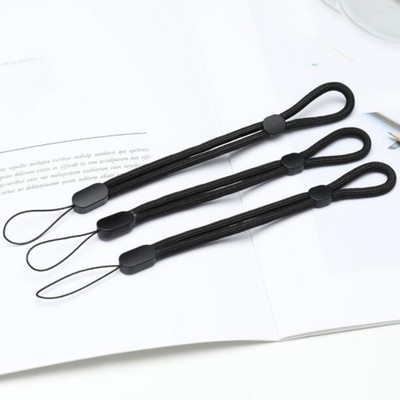 10 vnt. rankinio riešo dirželis, reguliuojami nailoniniai riešo dirželiai, raktų pakabuko virvelė mobiliojo telefono dėklo laikikliui, fotoaparatas, USB, ženklelis