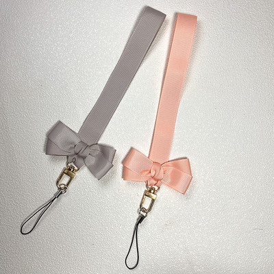 Bowknot mobiltelefon lánc medál univerzális kézszíj ajándék gyermekbarátoknak USB jelvény kulcstartó csuklópánt